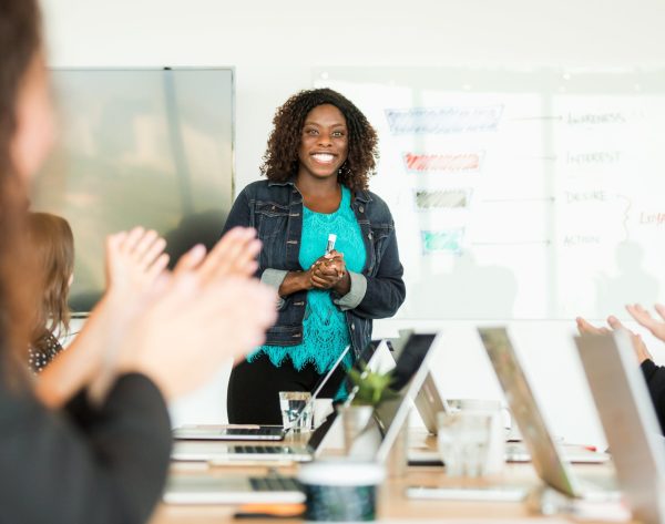 woman-happy-leading-meeting